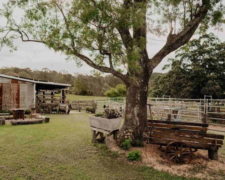 Yard with barn and rustic decor at the Old Glenroy Dairy
