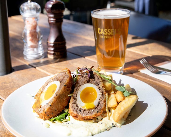 Venison scotch eggs and beers in the sun ar The Old Vicarage. 