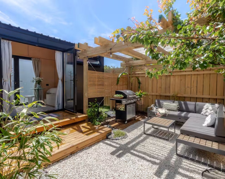 The outdoor entertaining space at The Sandbar Nook romantic stay near Christchurch, New Zealand