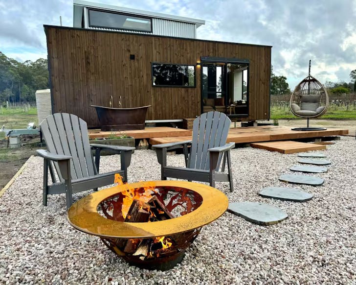 The outdoor bath and fire pit at The Soak Airbnb WA