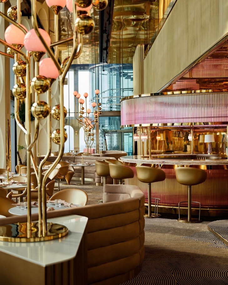 The pink and gold-styled restaurant at The Standard one of the best Bangkok hotels
