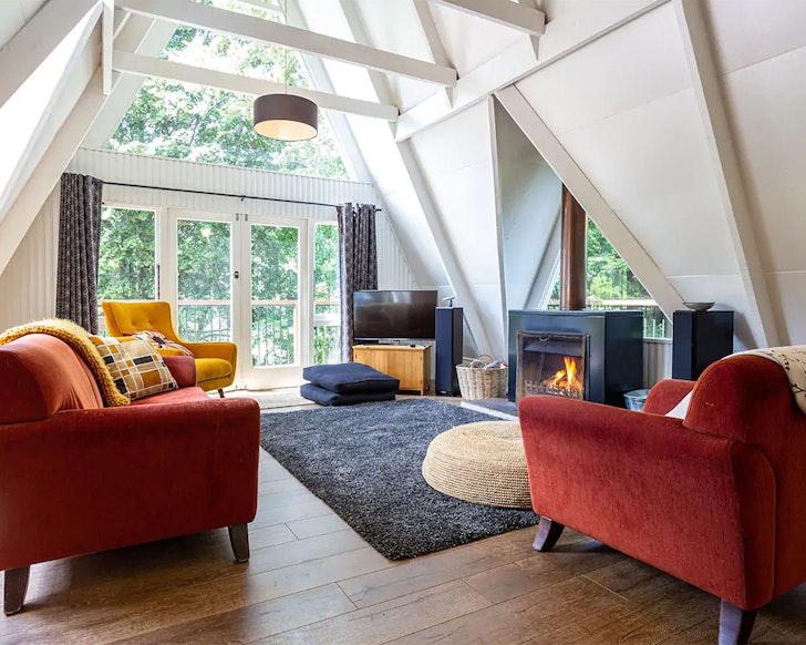 The living space with vaulted celing at The Treehouse one of the best Queenstown Airbnbs