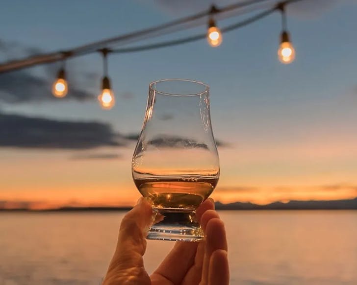 A dram of whisky at sunset. 