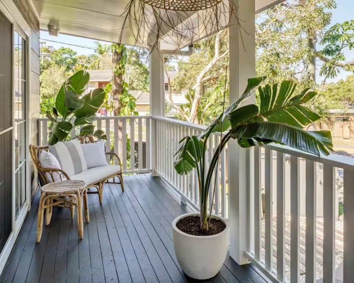 The leafy balcony at 
The Woods one of the best Noosa Airbnbs