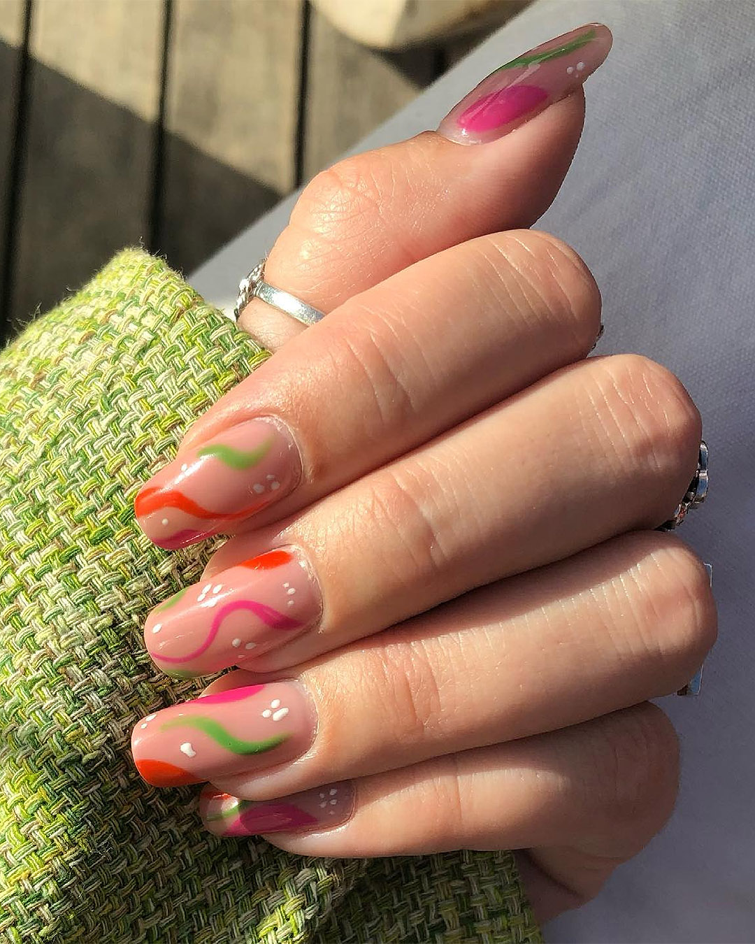 Brightly coloured nails by The Nail Studio.