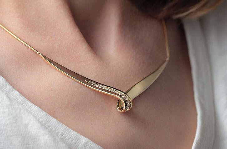 Someone wears a beautiful piece from The Rolling Mill in Wellington, one of the best jewellers in New Zealand.
