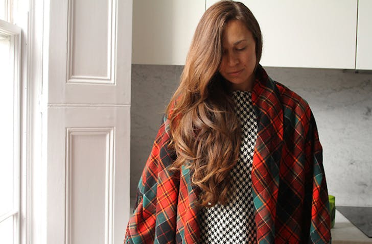 Tiffany Jeans wears a tartan coat