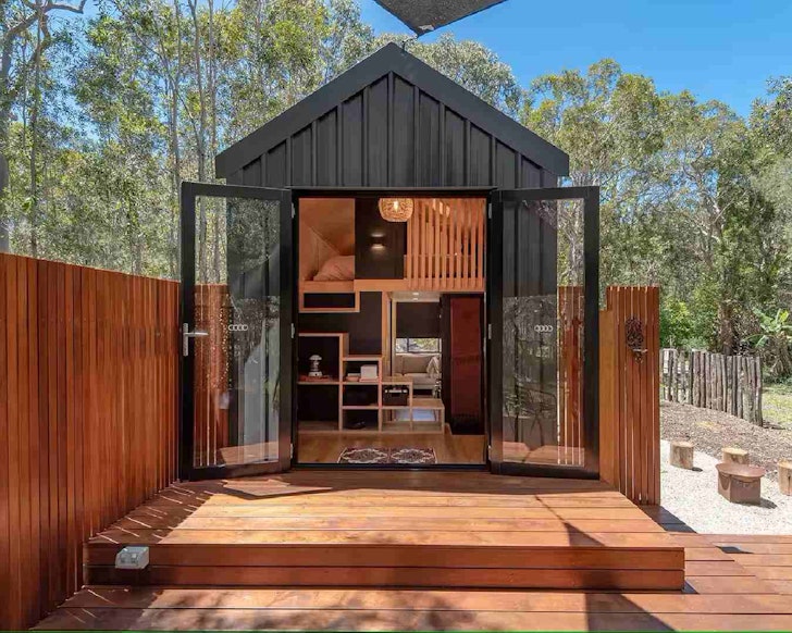The black exterior of Tiny Paradise tiny house in South East Queensland