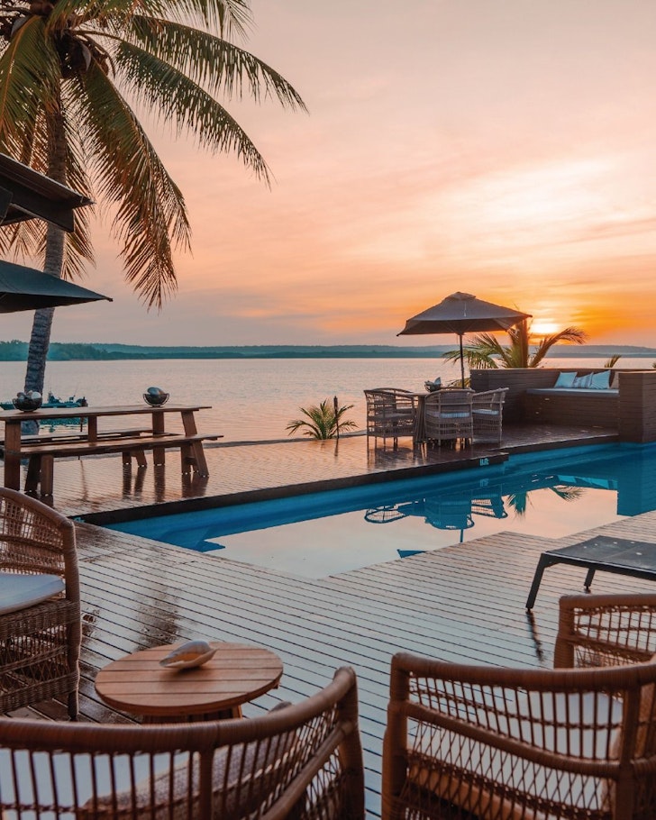 A view of the pool and ocean at Tiwi Island Retreat one of the best romantic getaways in Australia