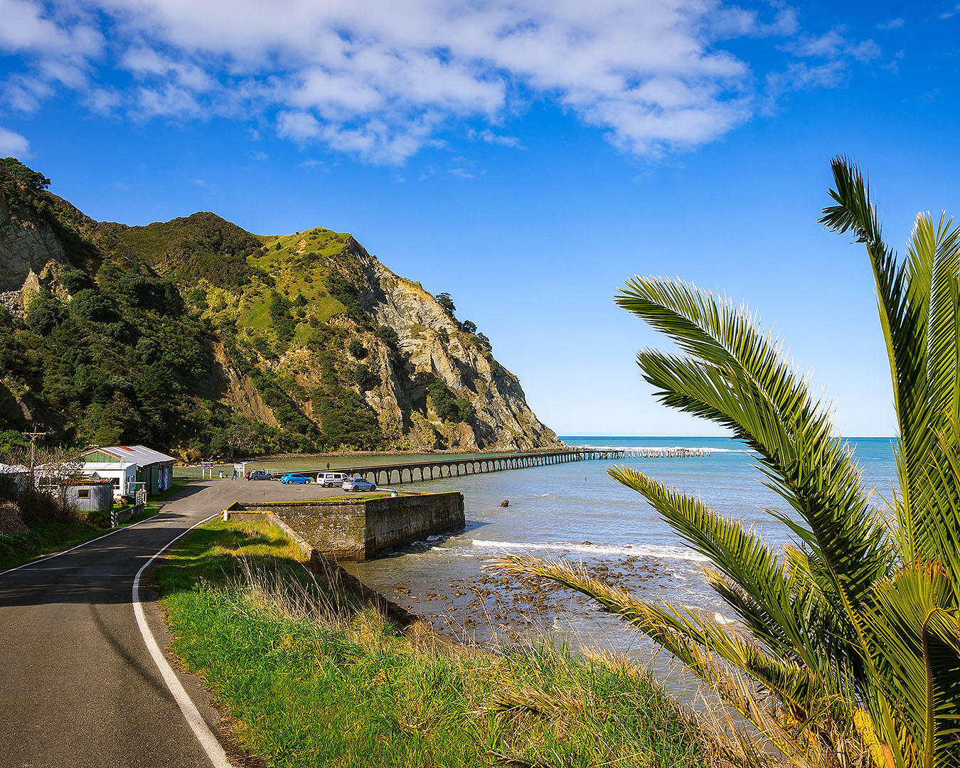 The famous wharf at Tokomaru Bay, one of the best spots for free camping in NZ.
