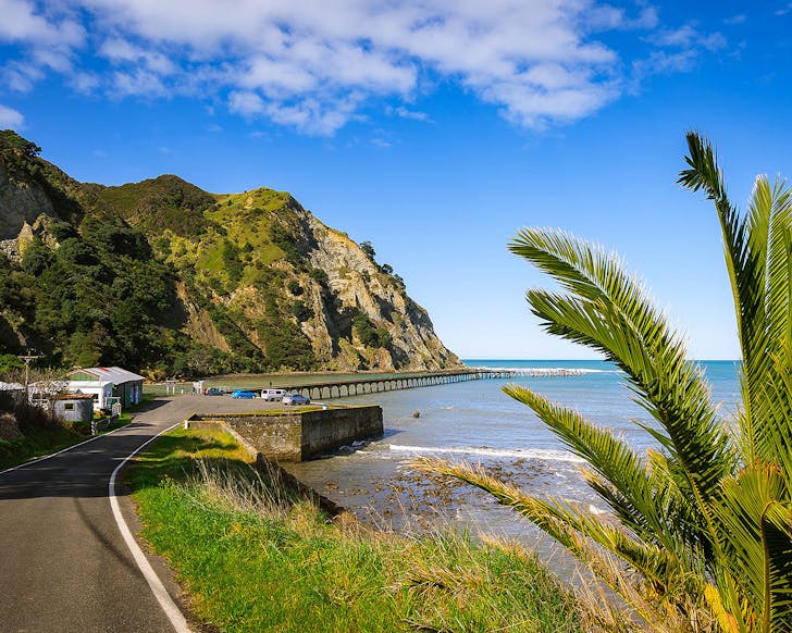 The famous wharf at Tokomaru Bay, one of the best spots for free camping in NZ.