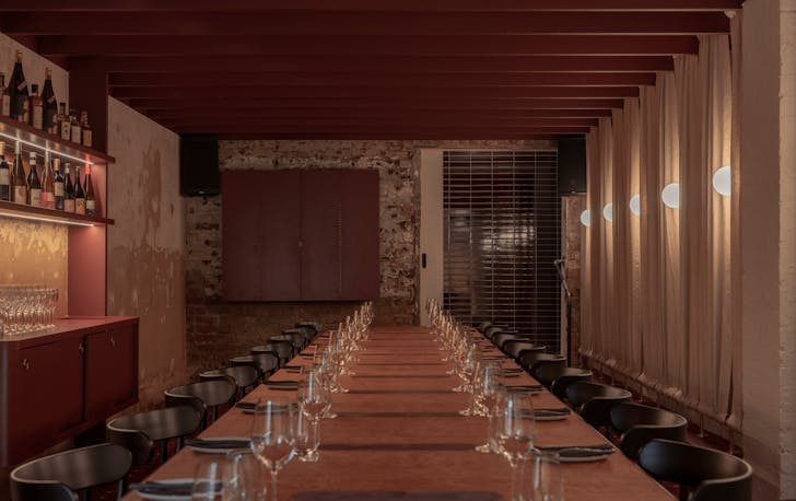 A large table which has been set up for dinner, a best private dining rooms melbourne 