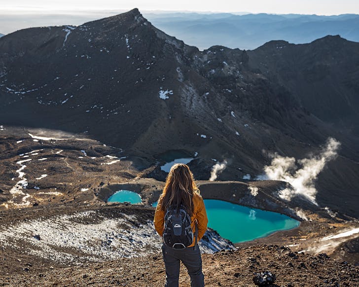 Someone gazes over the blue lakes.
