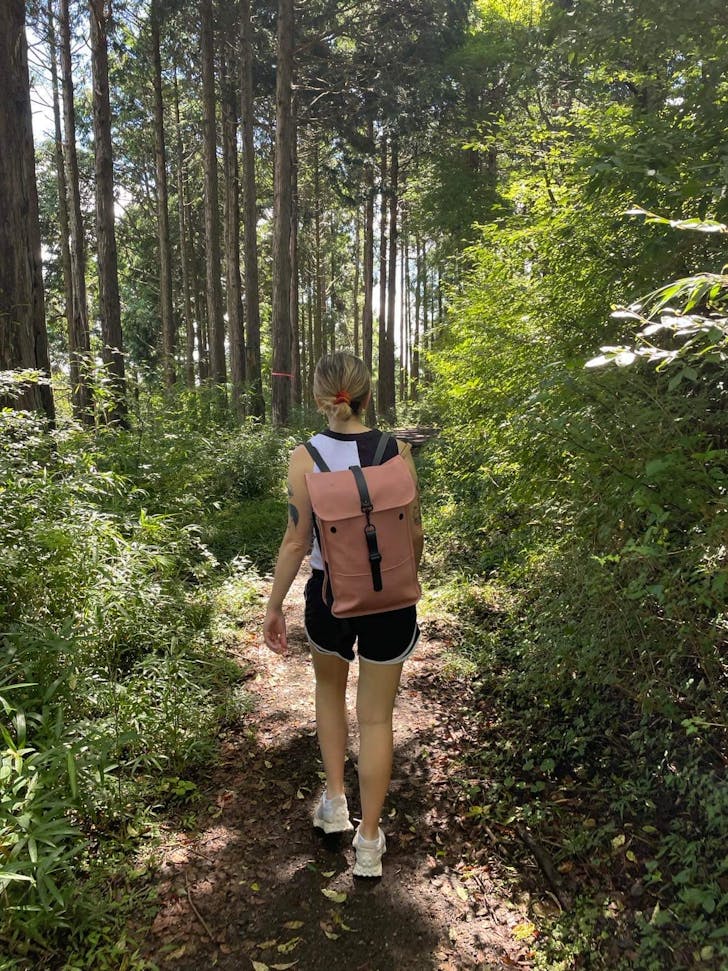 Girl with backpack on.