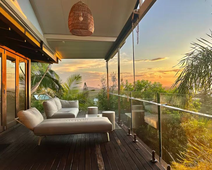 The deck overlooking the hinterland at Treetop Beach House one of the best Airbnbs in the Sunshine Coast