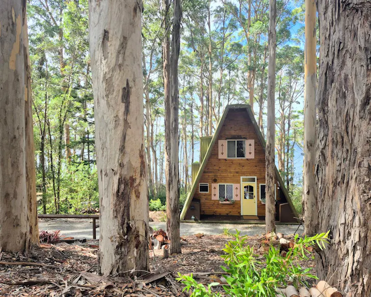 An exterior view of Treetops A-Frame best WA winter cabins and cottages