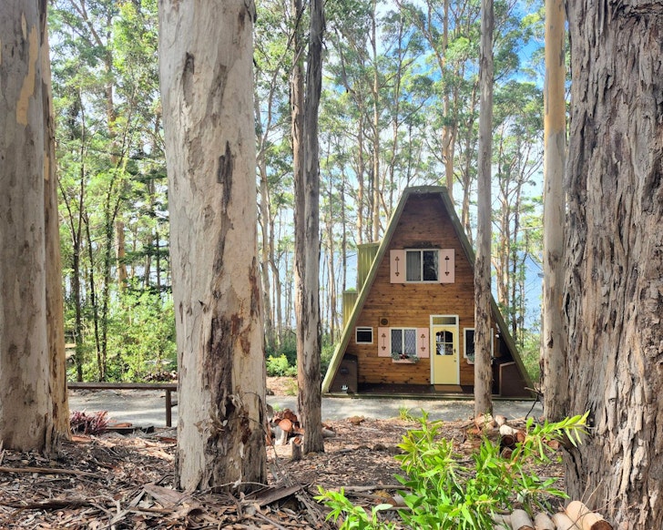 An exterior view of Treetops A-Frame best WA winter cabins and cottages