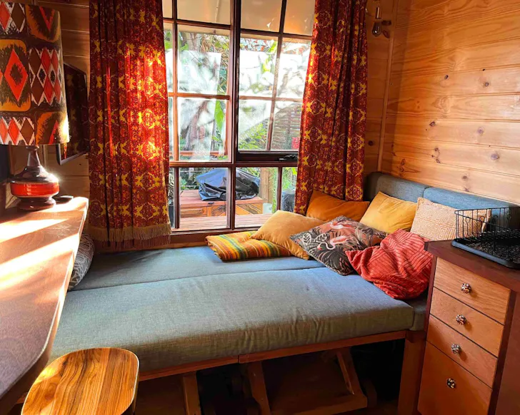 The bedroom at Tropical Inner City Tiny House best Airbnbs Brisbane