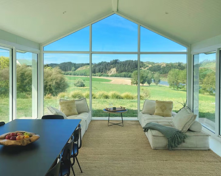 A view out the huge window at Tukituki River Home best family friendly accommodation New Zealand