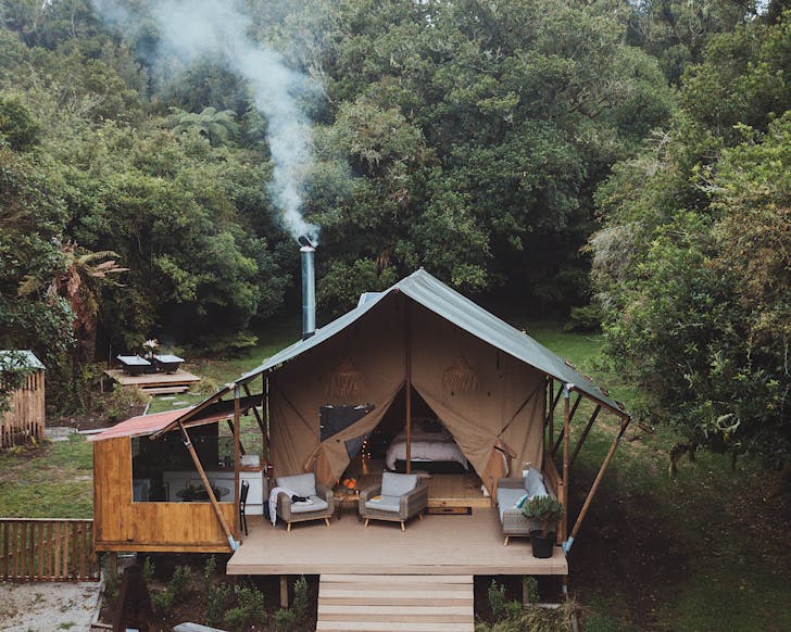 An adorable cottage in the forest, one of the most wonderful best places to stay in New Zealand. 