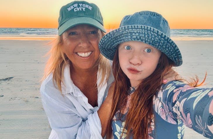 Two people on beach.