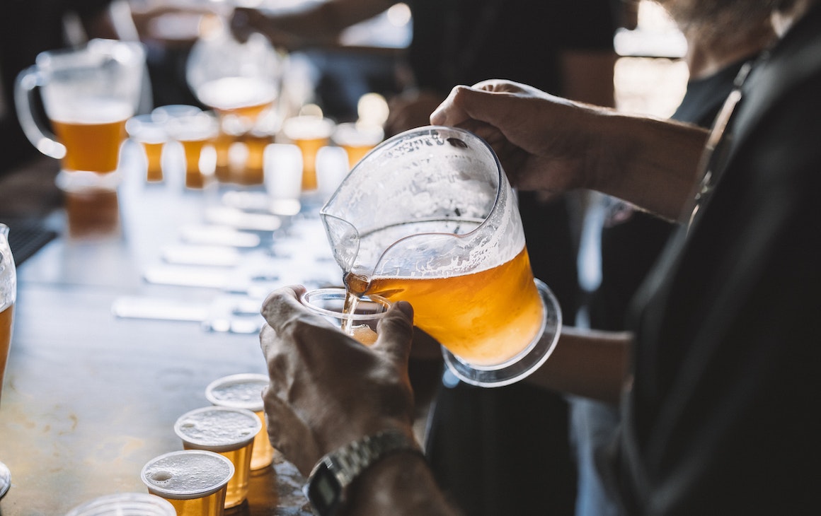 Beer being poured into a glass