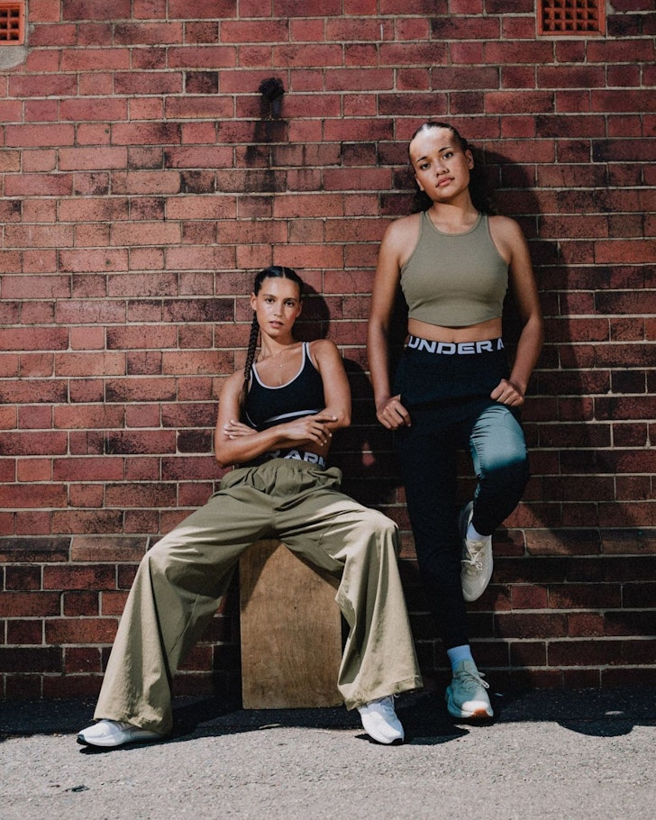 Two women wear clothes from Under Armour one of the best activewear brands
