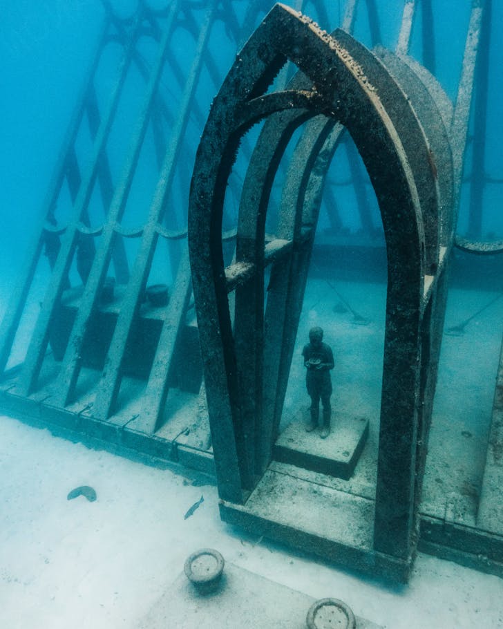A sentinel in the underwater art structures at the Museum of Underwater Art in Townsville.
