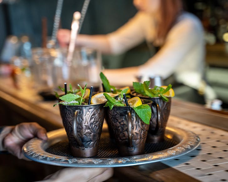 Cocktails ready to be delivered at V.T Station, one of the best bottomless brunches in Auckland.