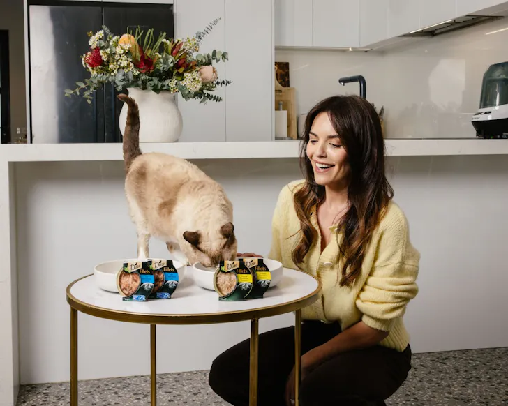 Actor Olympia Valance with her cat Jerry