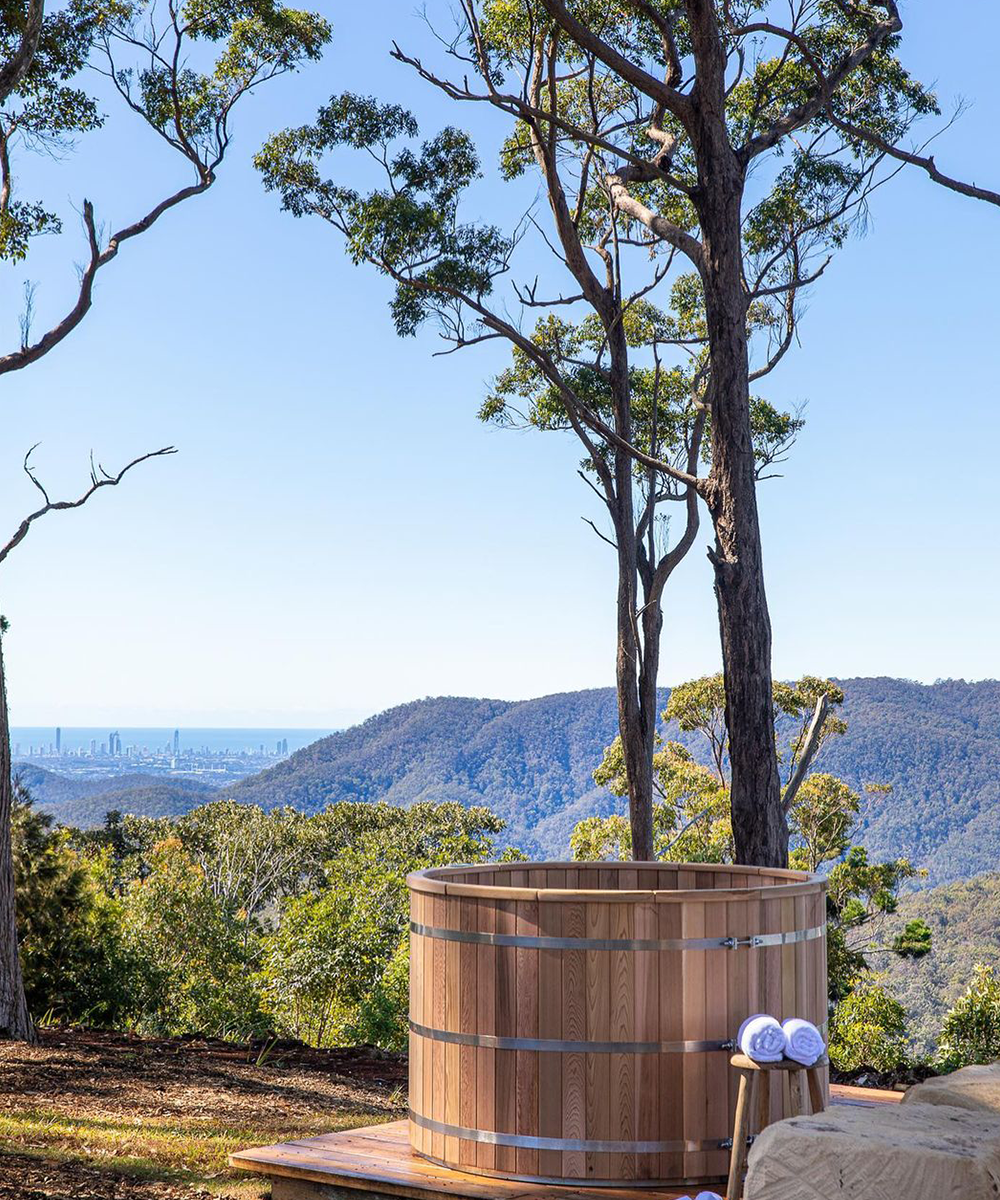 a hot tub overlooking the gold coast hinterland