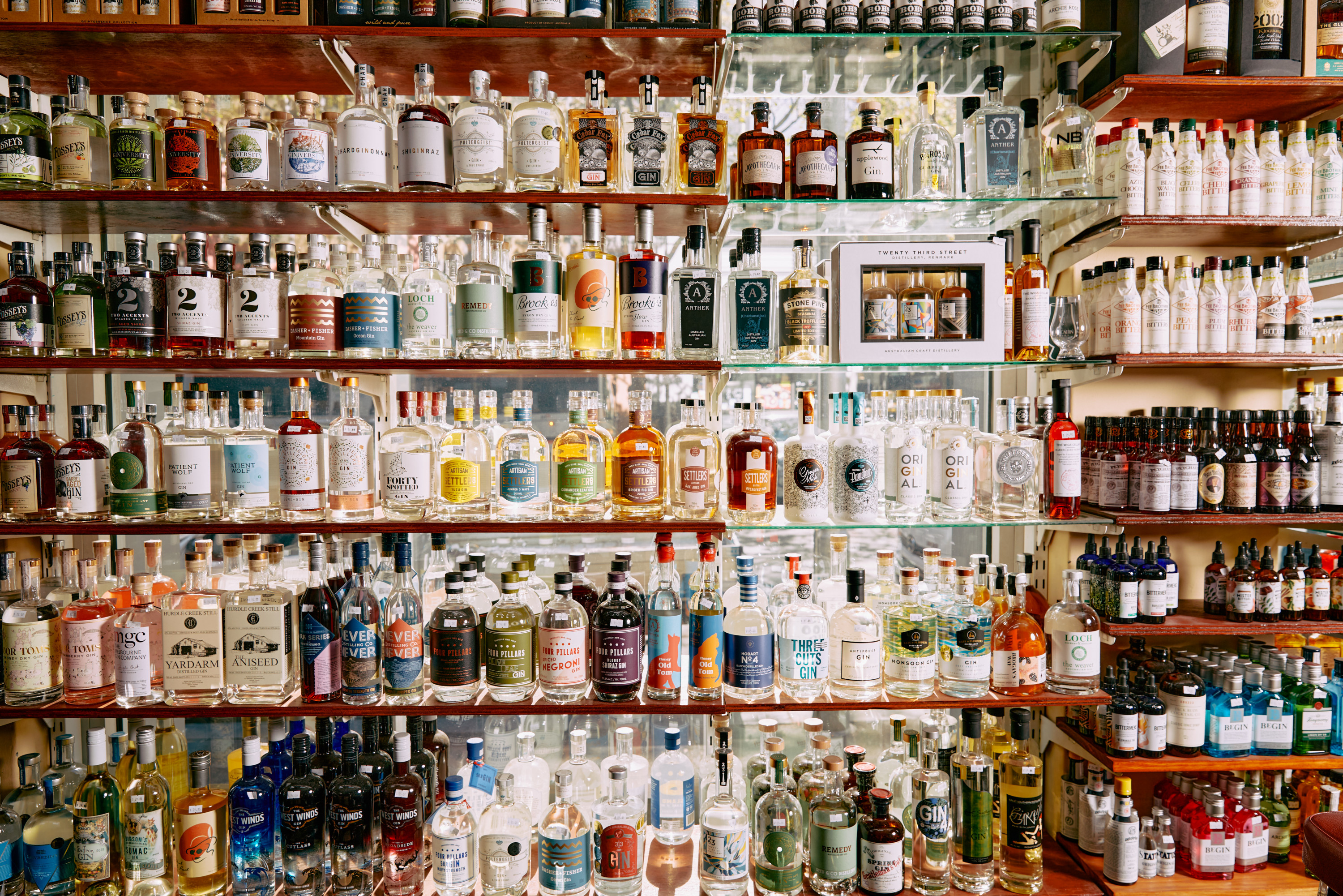 Several shelves stacked with fine liquor