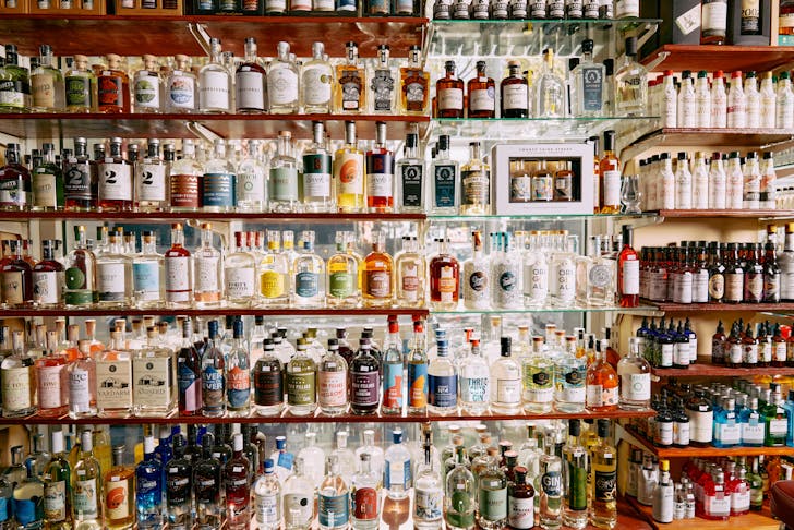 Several shelves stacked with fine liquor