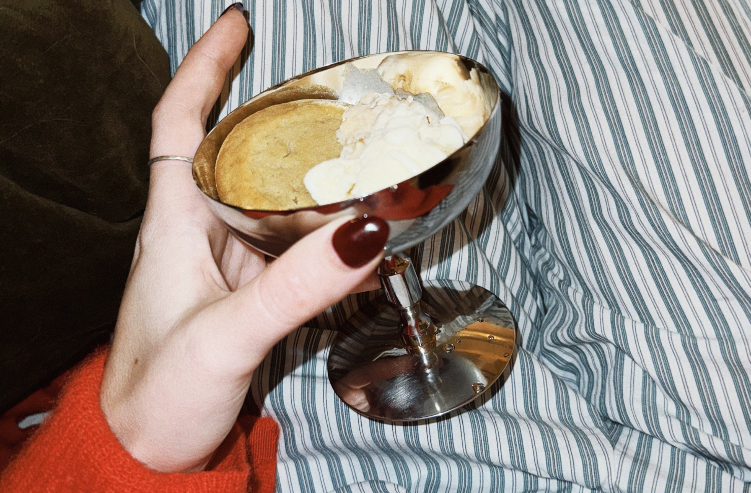 Hand holding dessert