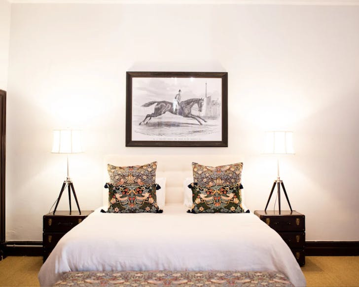 Bed with frame above