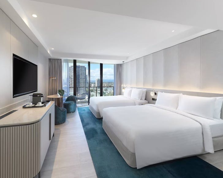 Two double beds in room