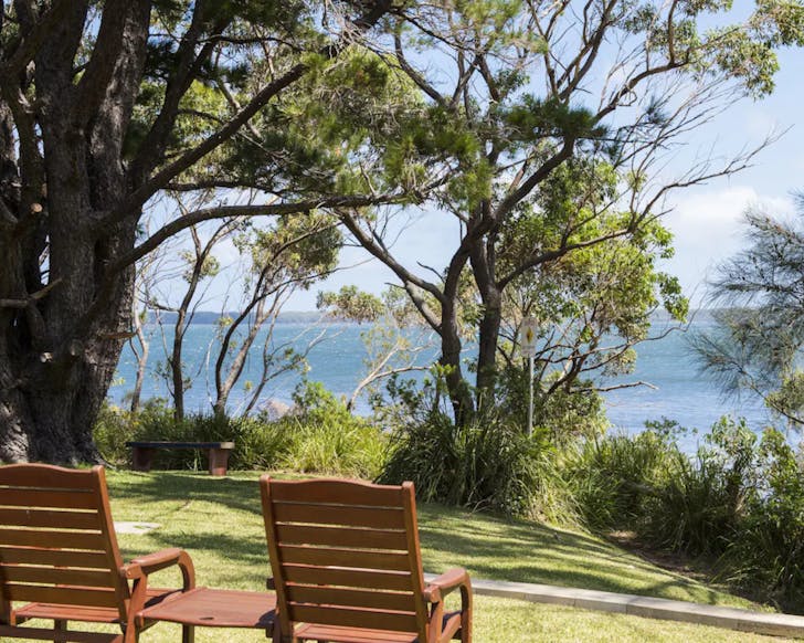 Two chairs on hill
