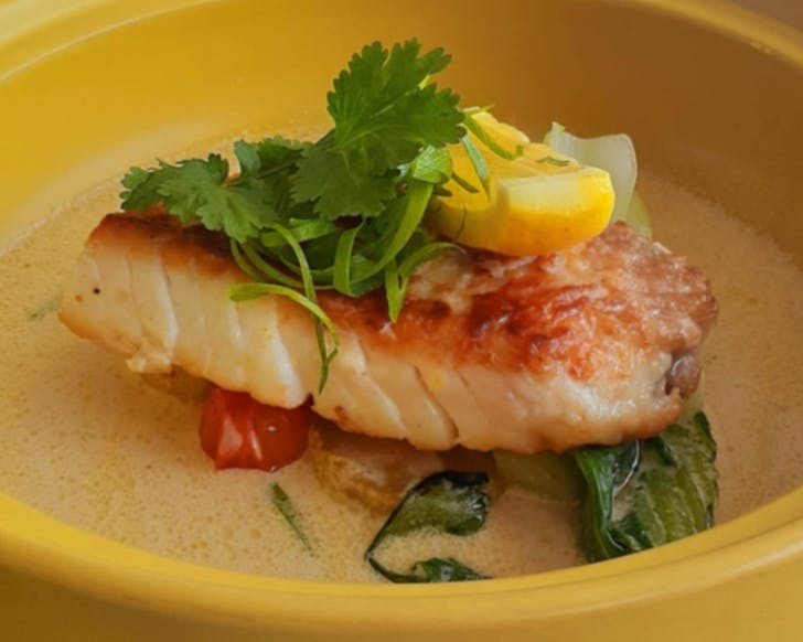 A beautiful fillet of fresh fish served on a bed of velvety sauce at War Pacific Island Fusion. 
