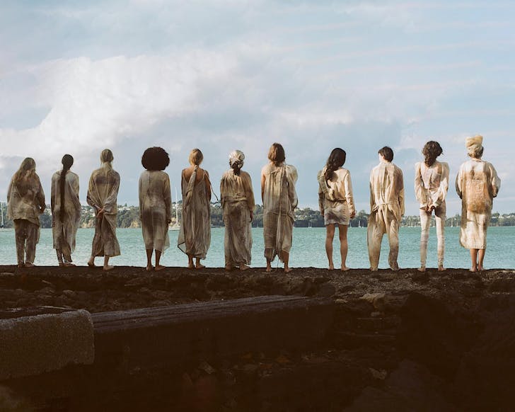 A line of models stand in Lela Jacobâs âWashed Up Bread Bagâ collection, looking out to see. 