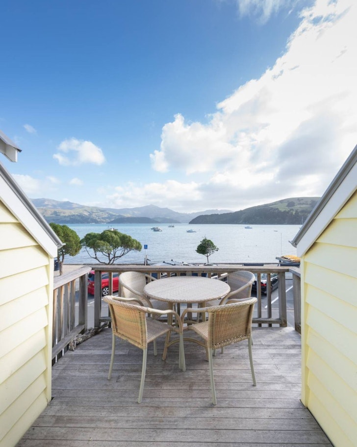 The view from the balcony at Waterfront Apartment one of the best beach house Airbnbs NZ