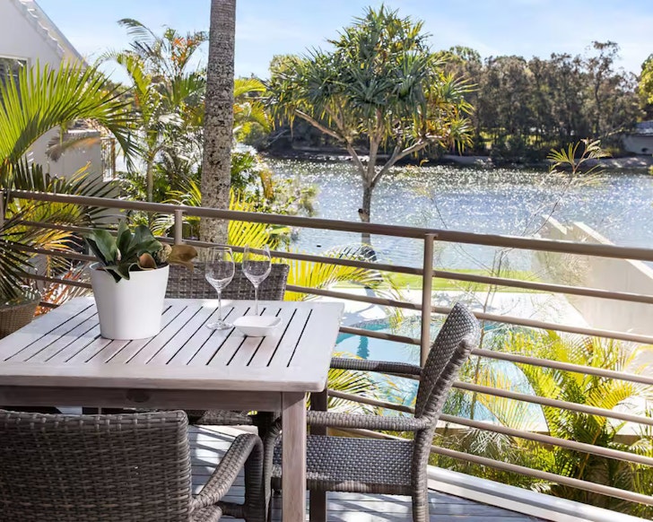 A view of the river from the deck at Waterfront Townhouse one of the best Noosa Airbnbs