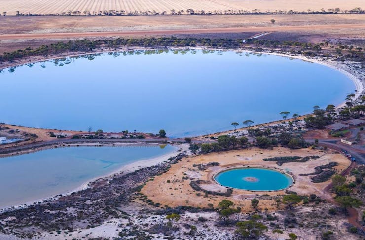 an aerial view of the colour-changing Lake Magic and turquoise saltwater pool near Wave Rock