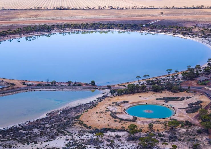 an aerial view of the colour-changing Lake Magic and turquoise saltwater pool near Wave Rock