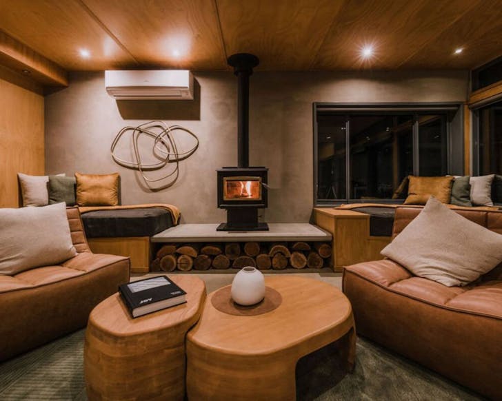 An indoor fireplace at Wildacres Luxury Lodge at Blackheath NSW