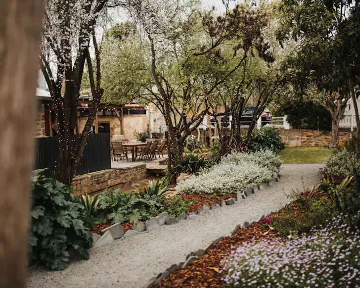 The charming garden at Wild Olive Cottage accommodation one of the best in Clare Valley