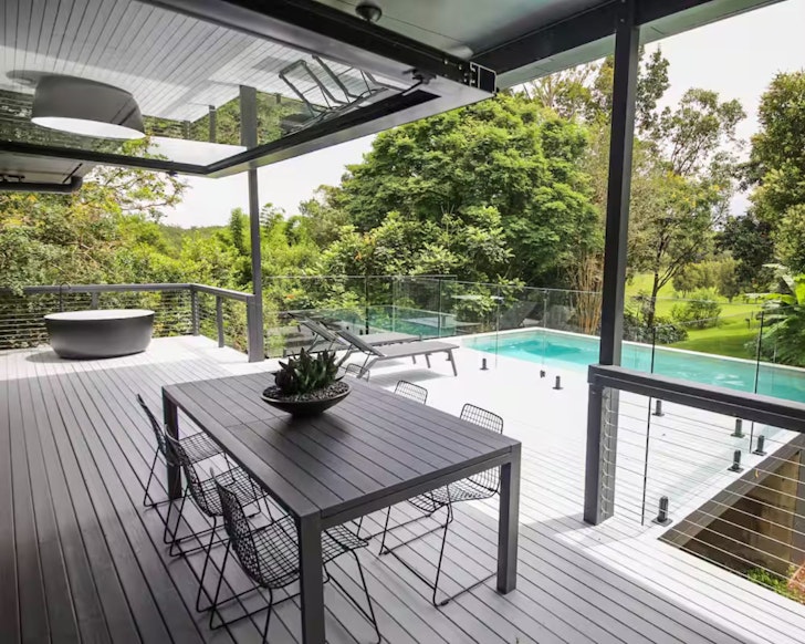 A view of the pool and outdoor bath at Wild Sparrow Lodge Airbnb Sunshine Coast