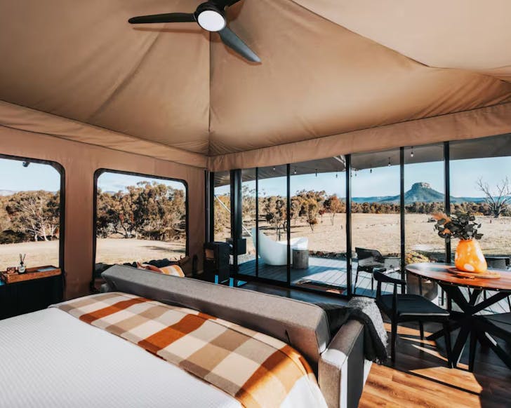 A view of the Capertee Valley from inside the Wildnest farm stay tent NSW