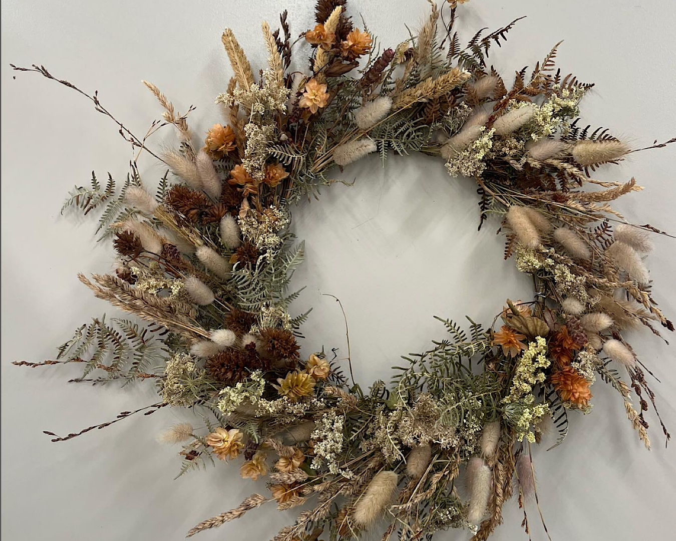 A wild, whimsical wreath made from autumnal botanicals. 