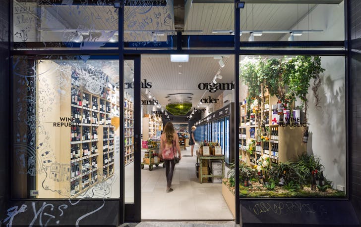 A shopfront image of Wine Republic with a person walking into Fitzroy best Shops. 