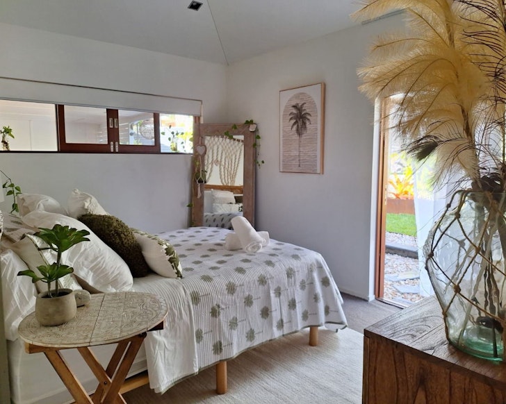 A bedroom at Winter Wonderland best large group accommodation near Brisbane